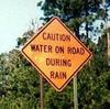 caution_water_on_road